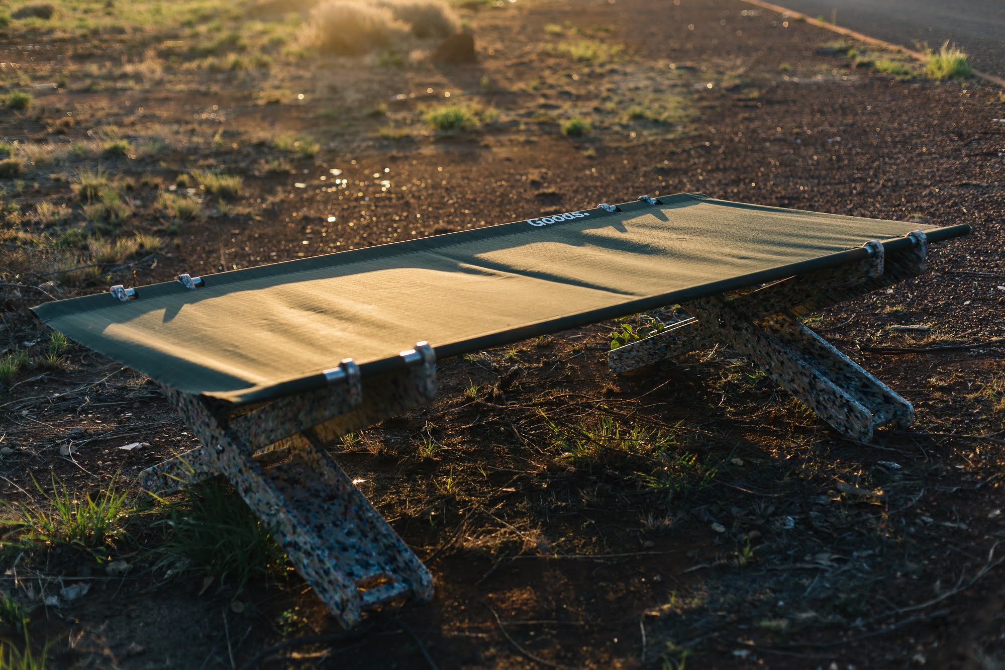 The Goods. Stretch Bed at golden hour on red earth
